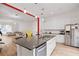 Open kitchen with island and modern appliances at 13042 Michael Callin Aly, Orlando, FL 32828