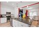 Stylish kitchen with an island and stainless steel appliances at 13042 Michael Callin Aly, Orlando, FL 32828