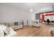 Bright living room with hardwood floors at 13042 Michael Callin Aly, Orlando, FL 32828
