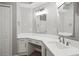 Updated bathroom features a stylish vanity with modern faucet and light fixture at 15832 Autumn Glen Ave, Clermont, FL 34714