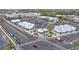 An aerial view of a well-planned shopping center with ample parking and a vibrant mix of retail outlets at 1632 Pinewood Dr, Orlando, FL 32804