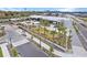 An aerial view of a modern commercial area with landscaped grounds, pedestrian walkways, and bicycle paths at 1632 Pinewood Dr, Orlando, FL 32804