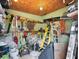 Organized shed interior featuring tools, equipment, and storage solutions for a functional workspace at 1632 Pinewood Dr, Orlando, FL 32804