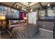 Stylized bedroom with unique pirate decor, comfortable bed, and immersive surroundings for an adventurous experience at 2217 Lelani Cir, Davenport, FL 33897