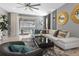 Comfortable living room with stylish furniture and a sliding glass door leading to the pool at 2217 Lelani Cir, Davenport, FL 33897