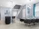 Open floor plan integrating kitchen, dining, and living areas with modern lighting at 2221 Lelani Cir, Davenport, FL 33897