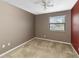 Cozy bedroom with wall-to-wall carpeting and a window for natural light at 2635 Graduate Ct, Orlando, FL 32826