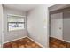 Well-lit room featuring tile flooring and a window with blinds at 2635 Graduate Ct, Orlando, FL 32826