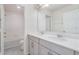 Bathroom showcasing a double sink vanity with contemporary fixtures at 2811 Alpine Meadow Ln, Kissimmee, FL 34744