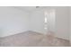 Neutral carpeted bedroom with white walls and natural light coming in at 2811 Alpine Meadow Ln, Kissimmee, FL 34744