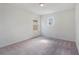 Bright bedroom features neutral walls, light carpeting, and dual windows for natural light at 2811 Alpine Meadow Ln, Kissimmee, FL 34744
