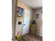 room featuring wood-look flooring and bright artwork at 3045 Aaron Burr Ave # P-12E, Winter Park, FL 32792