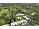 Aerial view showcasing the well-maintained condo community amidst lush greenery and a nearby golf course at 3104 Harrison Ave # A6, Orlando, FL 32804