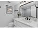 Bathroom featuring a white vanity, black hardware, and a walk-in shower at 3104 Harrison Ave # A6, Orlando, FL 32804