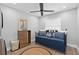 Charming bedroom features a daybed, round rug, ceiling fan, and lots of natural light at 3104 Harrison Ave # A6, Orlando, FL 32804