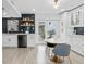 Bright eat-in kitchen with stylish cabinetry and a breakfast nook overlooking the exterior at 3104 Harrison Ave # A6, Orlando, FL 32804