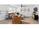 Bright living room showcasing tile floors, recessed lighting, a large window, and stylish contemporary furnishings at 3104 Harrison Ave # A6, Orlando, FL 32804