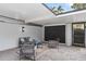 Outdoor patio area with comfortable seating, contemporary furniture, and a cozy ambiance at 3104 Harrison Ave # A6, Orlando, FL 32804