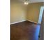 Neat bedroom with wood-look flooring, ceiling fan, and natural light at 315 Wymore Rd # 207, Altamonte Springs, FL 32714