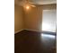 Clean bedroom featuring wood flooring, ceiling fan, and bright window at 315 Wymore Rd # 207, Altamonte Springs, FL 32714