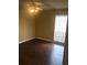Bedroom with hardwood floors, a ceiling fan, and a window at 315 Wymore Rd # 207, Altamonte Springs, FL 32714