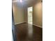 Living room with hardwood floors, and view of the kitchen at 315 Wymore Rd # 207, Altamonte Springs, FL 32714
