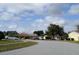 Charming street view with well-maintained houses, green spaces, and a serene residential ambiance at 3673 Westland Ct, Orlando, FL 32818