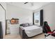 Bedroom featuring a daybed, fish tank, neutral colors, and a window at 3953 Saltmarsh Loop, Sanford, FL 32773
