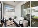Screened outdoor patio featuring comfortable seating, a ceiling fan, and views of the backyard at 3953 Saltmarsh Loop, Sanford, FL 32773