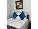 Relaxing bedroom with well-lit soft white linens and accent pillows at 4024 Breakview Dr # 10804, Orlando, FL 32819