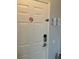Front door with no smoking sign, a digital lock and visitor instructions at 4024 Breakview Dr # 10804, Orlando, FL 32819