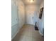 Hallway with tile flooring, closet, and front door at 4024 Breakview Dr # 10804, Orlando, FL 32819