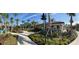 A pool side bar with multiple lounge chairs and lush landscaping creates a relaxing oasis at 4024 Breakview Dr # 10804, Orlando, FL 32819