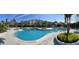 A stunning resort-style pool with lounge chairs and lush landscaping creates a relaxing oasis at 4024 Breakview Dr # 10804, Orlando, FL 32819