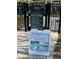 A 'no diving' sign next to a fence at the pool at 4024 Breakview Dr # 10804, Orlando, FL 32819