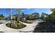 A splash pad with fountains and comfortable lounge seating next to well manicured landscaping at 4024 Breakview Dr # 10804, Orlando, FL 32819