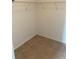 Walk-in closet with tile flooring at 4324 Paradise Cove Ct, Kissimmee, FL 34746