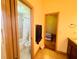 Cozy bathroom featuring a shower over the bath and an earth tone color scheme at 450 Blue Smoke Ct, Lake Mary, FL 32746