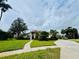 Beautiful single-Gathering home on a large lot with mature trees and lush landscaping, offering great curb appeal at 450 Blue Smoke Ct, Lake Mary, FL 32746