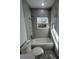 Bathroom showcasing modern fixtures, tile surround, and natural lighting at 6425 Curtis St, Orlando, FL 32807