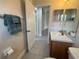 Bathroom with vanity sink, mirror, and toilet at 649 Gazelle Dr, Kissimmee, FL 34759