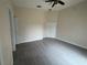 This spacious bedroom features tile floors, a ceiling fan, and a double closet at 649 Gazelle Dr, Kissimmee, FL 34759