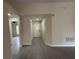 Bright entryway features tile floors, neutral walls, and a front door at 649 Gazelle Dr, Kissimmee, FL 34759