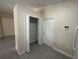 The pantry is located next to the refrigerator and features folding doors and wire shelving at 649 Gazelle Dr, Kissimmee, FL 34759