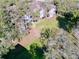 Spacious condo building with green lawn surrounded by mature trees offering serene views at 7147 Yacht Basin Ave # 115, Orlando, FL 32835