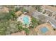 Aerial view showcasing the community pool and lush landscaping at 7159 Cadiz Blvd, Orlando, FL 32819