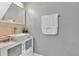 Elegant bathroom sink with a modern faucet, decorative accents, and a fresh towel at 7159 Cadiz Blvd, Orlando, FL 32819