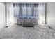 This luxurious bedroom features a plush bed with decorative pillows and ambient bedside lighting at 7159 Cadiz Blvd, Orlando, FL 32819