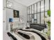 Contemporary home office featuring a sleek desk, stylish decor, and abundant natural light at 7159 Cadiz Blvd, Orlando, FL 32819