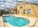 Inviting screened-in pool with clear blue water and ample deck space for lounging on a sunny day at 7952 Heritage Entrance Blvd, Kissimmee, FL 34747